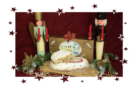 angeschnittener Butterrosinenstollen dekorativ präsentiert